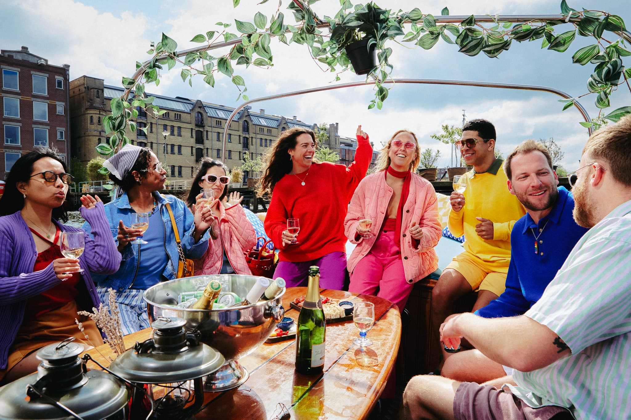 group of expats on a canal boat amsterdam